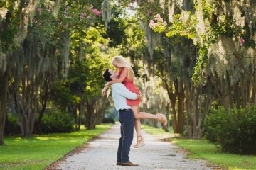 engagement pictures taken in charleston sc garden by charleston wedding photographers king street studios